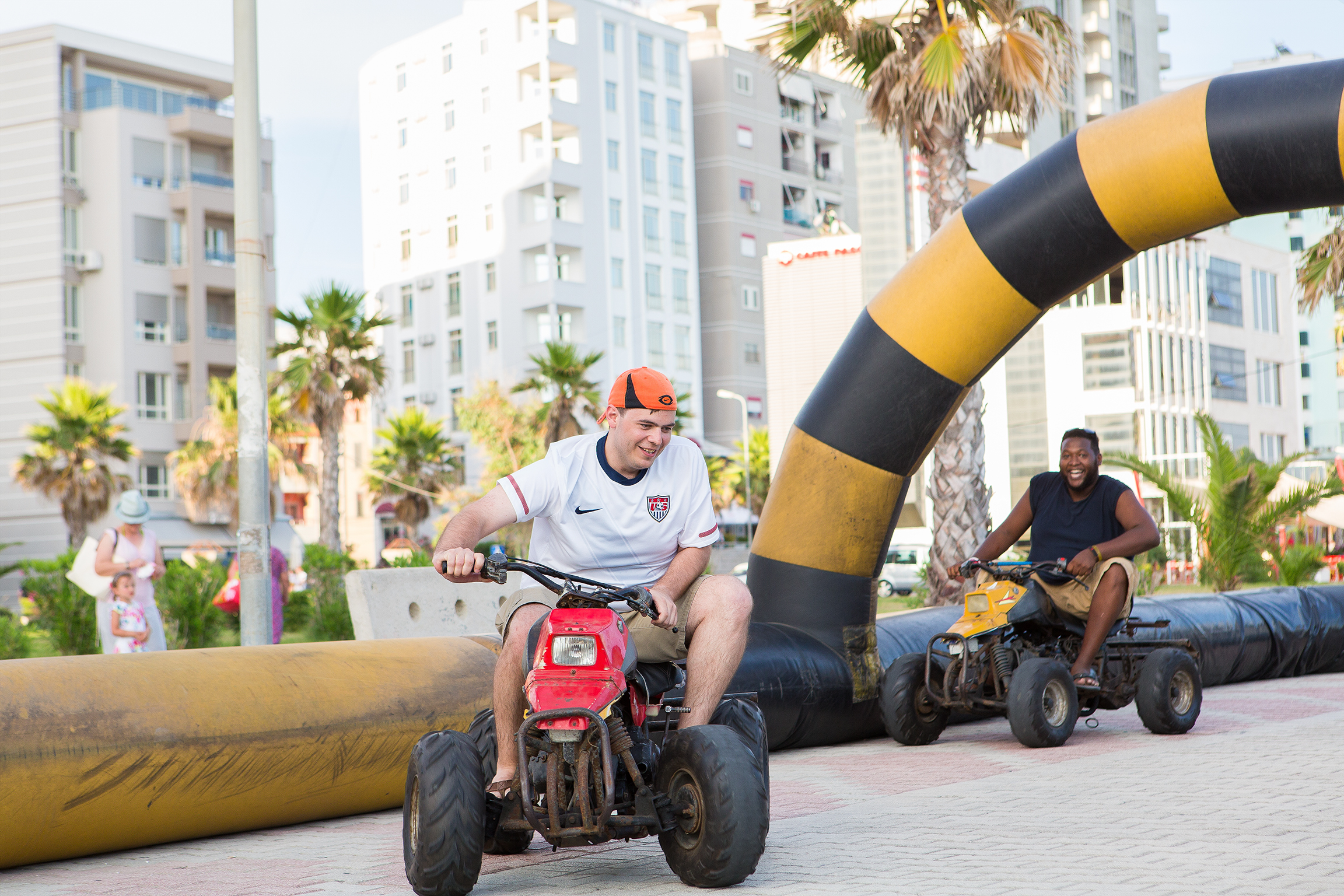 The guys having fun at the beachfront carnival